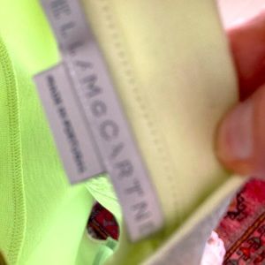 Stella McCartney silver tee shirt. Never worn size 42 or 6 (paid 500 Canadian)